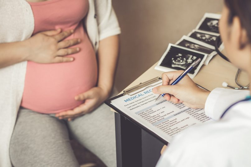 Happy,Pregnant,Woman,Visit,Gynecologist,Doctor,At,Hospital,Or,Medical Happy,Pregnant,Woman,Visit,Gynecologist,Doctor,At,Hospital,Or,Medical